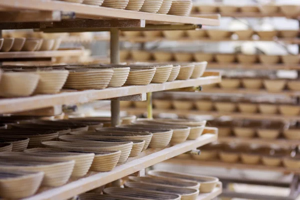 Shelves with bread forms — Stock Photo, Image