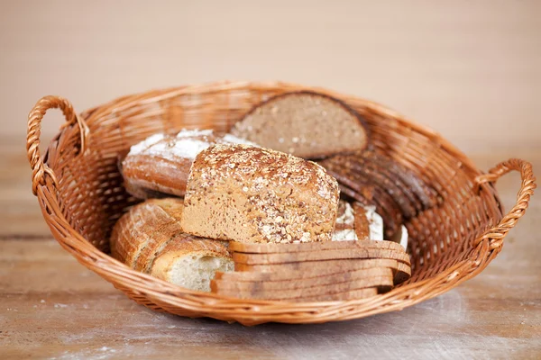 Breads displayed in bread basket — Stock Photo, Image