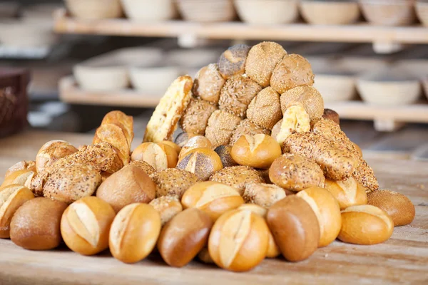 Various breads displayed on table — Stock Photo, Image