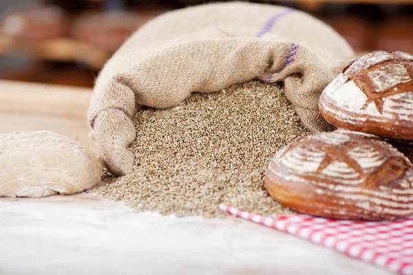 Sack filled with wheat — Stock Photo, Image