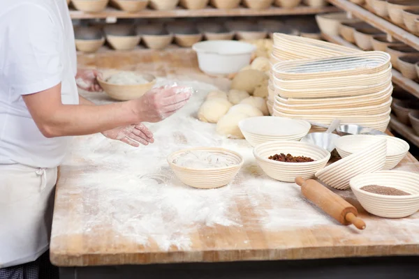 Chef and co-worker at bakery — Stock Photo, Image