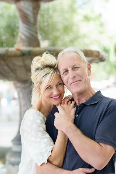 Middle-aged couple with lovely smiles — Stock Photo, Image