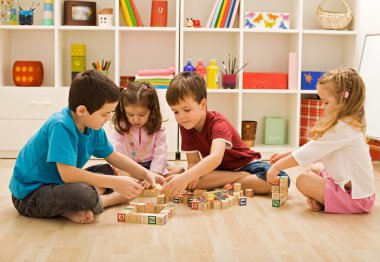 Children playing with blocks clipart