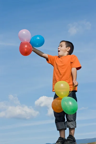 Ragazzo con palloncini — Foto Stock