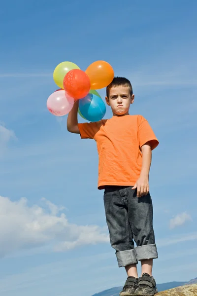 Ragazzo con palloncini — Foto Stock