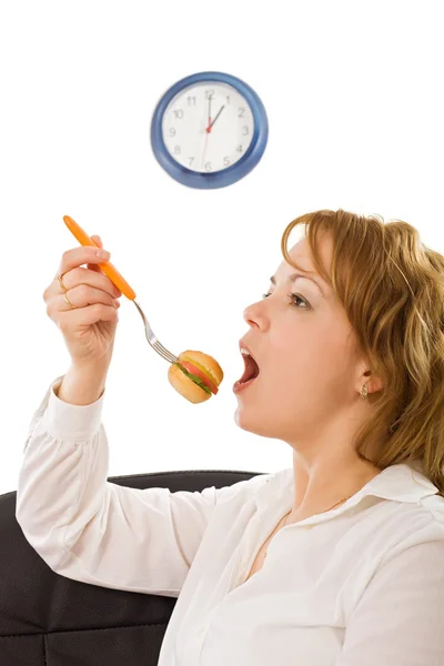 Young woman eating — Stock Photo, Image