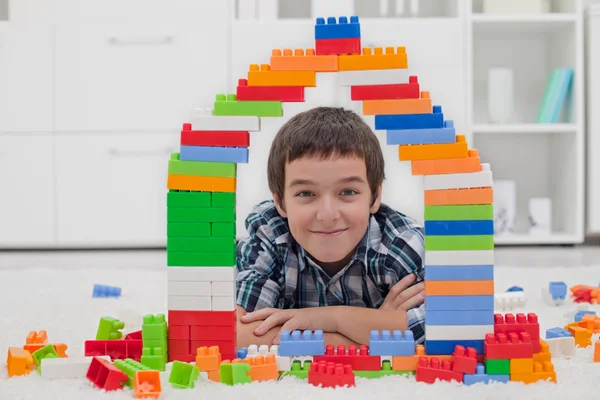 Little boy playing with blocks — Stock Photo, Image