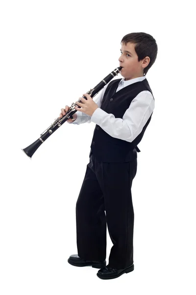 Chico tocando en el clarinete Imagen de archivo