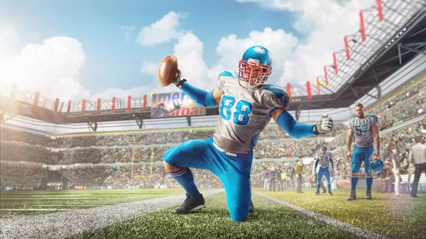 Stadyumda hareketli ve hareketli bir futbolcu. Çimlerin üzerinde tek dizinin üzerinde duruyor. Spor duyguları.