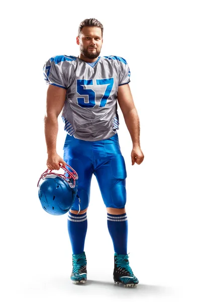 Spor. Amerikalı bir futbolcu elinde bir kask tutuyor. Beyaz arkaplanda izole