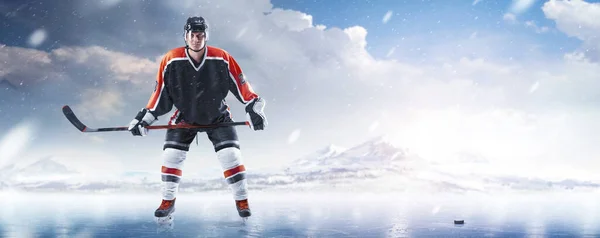 Professional hockey player start the game on ice. Sports emotions. Hockey concept. Winter panorama. Sport