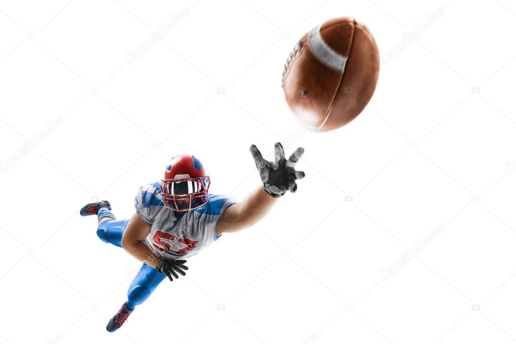American football player catches the ball and flies in the air. Sportsman in action. Isolated on white background. Sport