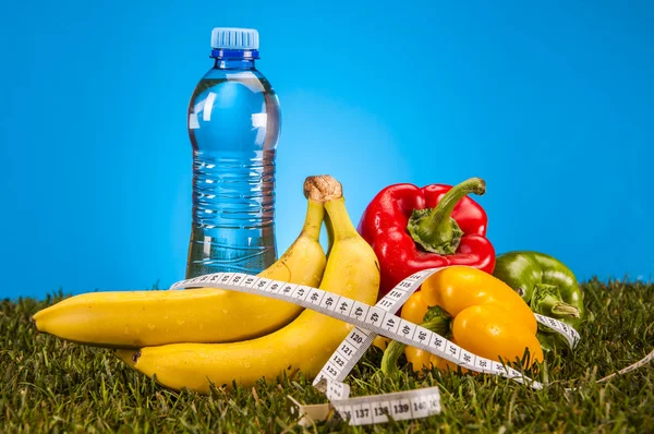 Health and fitness stuff with fruits and vegetables — Stock Photo, Image