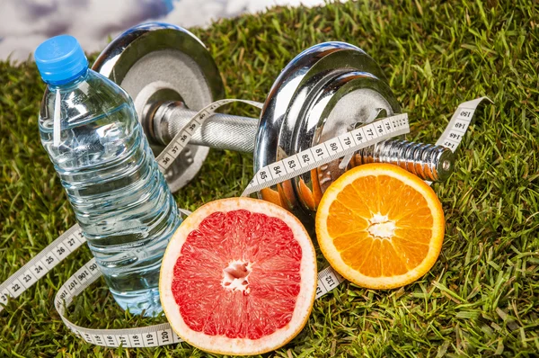 Colorful fitness composition, blue background — Stock Photo, Image