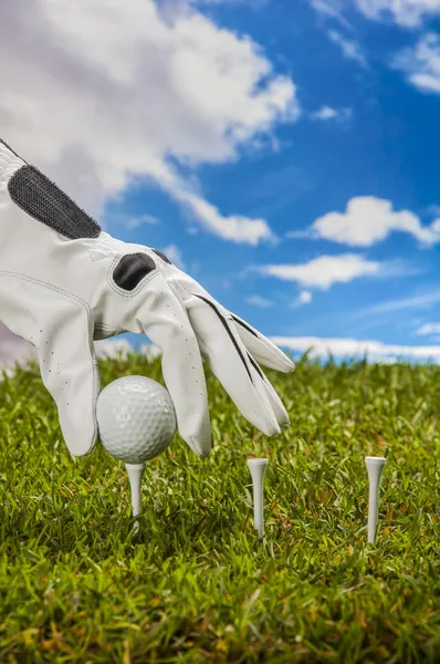 Golf stuff on sky background with intense light — Stock Photo, Image