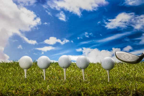 Golf stuff on sky background with intense light — Stock Photo, Image