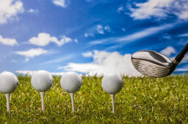 Golf stuff on sky background with intense light — Stock Photo, Image