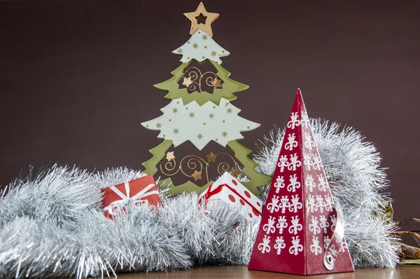 Christmas stuff on wooden table with dark background — Stock Photo, Image