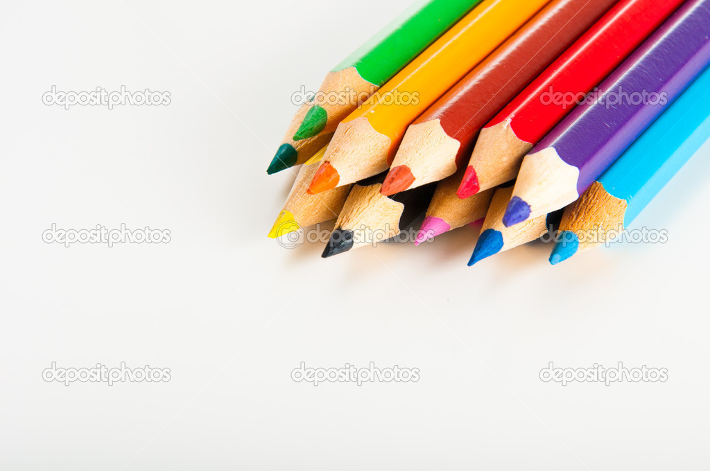 Variety of wooden color pencils isolated on white background