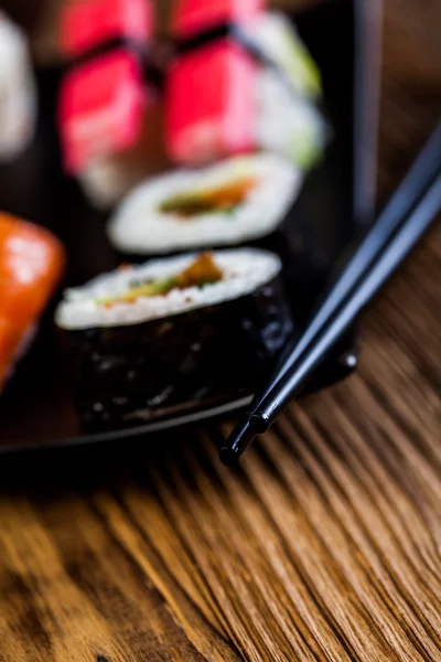 Sushi set on the wooden table — Stock Photo, Image