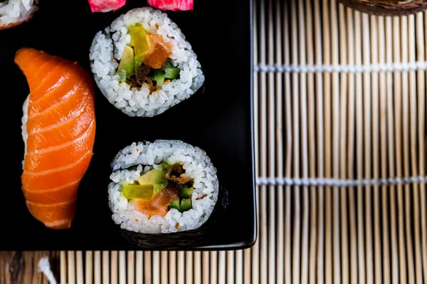 Decorative composition with sushi, Japanese seafood — Stock Photo, Image