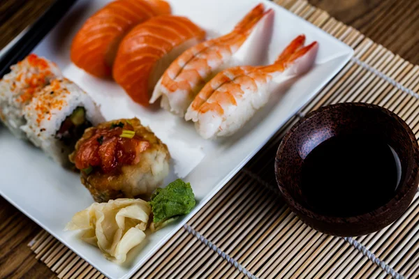 Oriental magic theme with Japanese seafood, sushi set — Stock Photo, Image