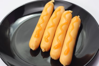 izole plaka beyaz sosis