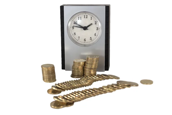 Horloges en munten — Stockfoto