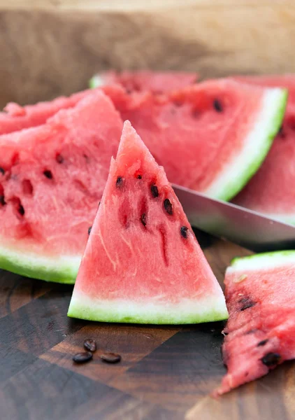 Watermelon slices on the cutting board Stock Photo