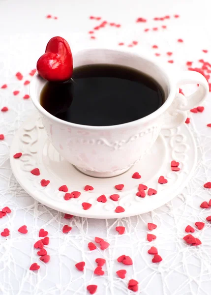 White cup of coffee decorated with red heart — Stock Photo, Image