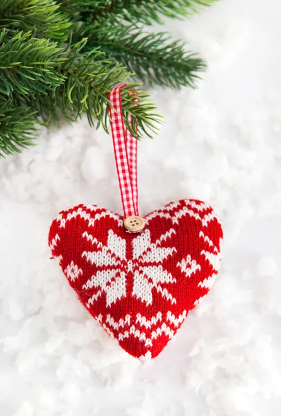 Knitted heart on the snow — Stock Photo, Image