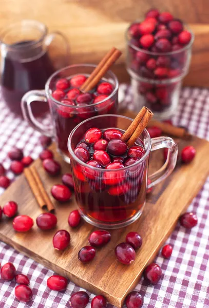 Mulled wine with cranberry and spices — Stock Photo, Image
