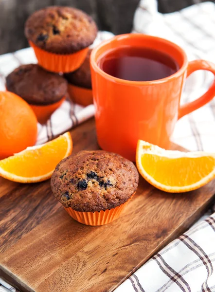 Fresh orange berry muffins — Stock Photo, Image