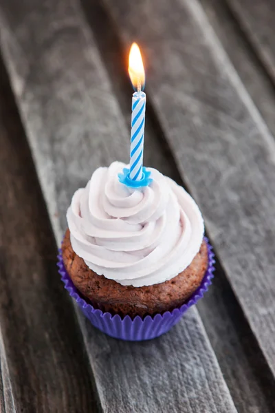 Tasty birthday cupcake with candle Royalty Free Stock Photos