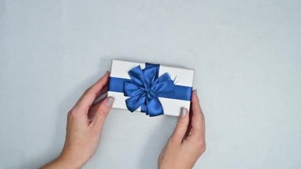 Christmas Silver Gift Dark Blue Ribbon Putting Silver Theme Stop — Stock Video