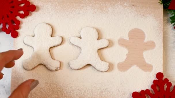 Close Caucasian Hands Woman Taking One Christmas Gingerbread Man Cookie — Stock Video