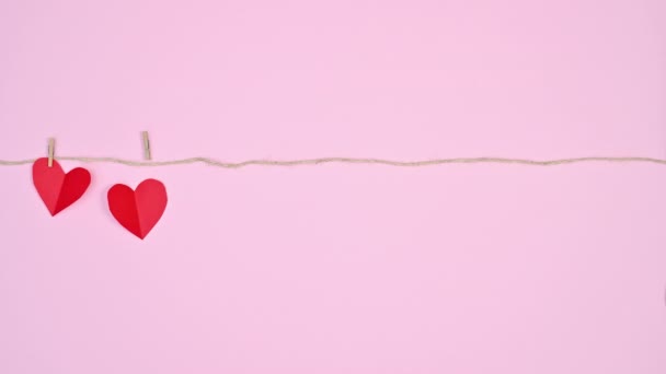 Valentine Day Stop Motion Hearts Hanging Rope Pink Theme — Stock Video