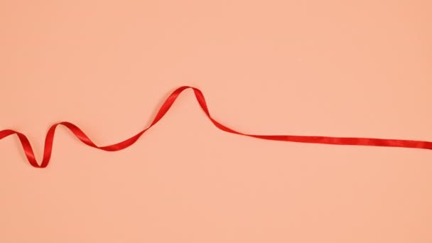 Red Ribbon Write Love Orange Theme Stop Motion — Stock Video