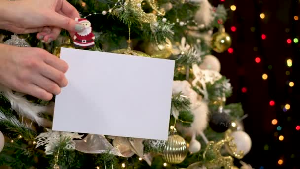 Hooking Papír Kártya Jegyzet Karácsonyfa Villogó Fények Arany Fehér Díszek — Stock videók