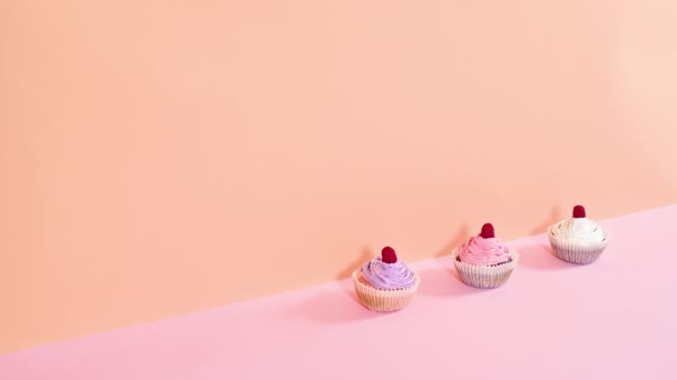 Delicious Cute Cup Cakes Raspberry Cream Appear Row Orange Pink — Stock Video