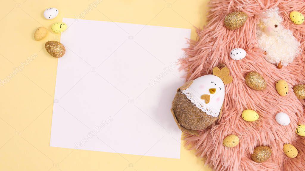 Spring scene with eggs and Easter decorations on eco friendly fur on bright pastel yellow or orange background. Flat lay creative copy space paper card note