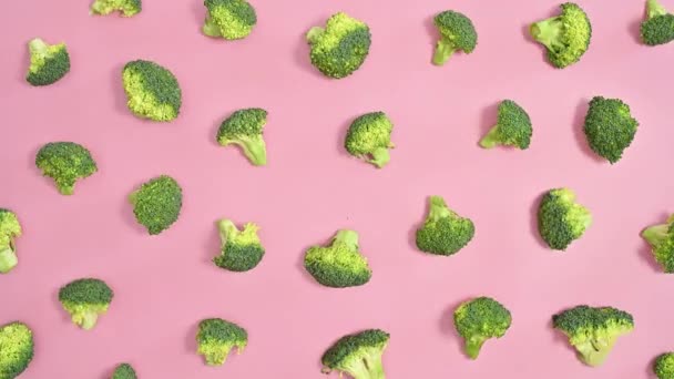 Broccoli Pattern Pastel Pink Background Stop Motion Flat Lay — Αρχείο Βίντεο