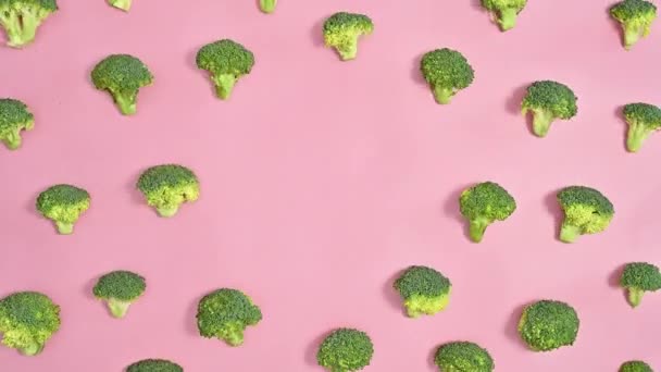 Creative Copy Space Pastel Pink Background Moving Green Broccoli Stop — Video Stock