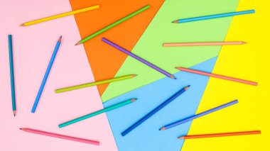 Colorful wooden pencils on colorful background.Back to school and art concept