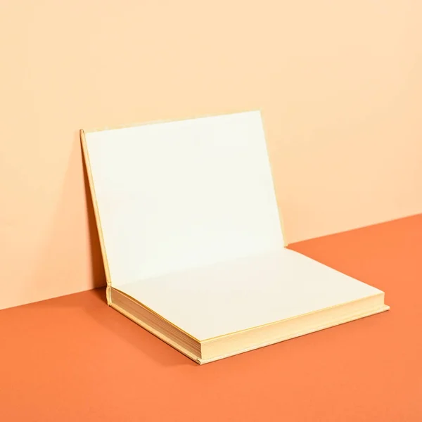 Creative Backgorund Open Hardcover Book Two Shade Orange Background Flat — 스톡 사진