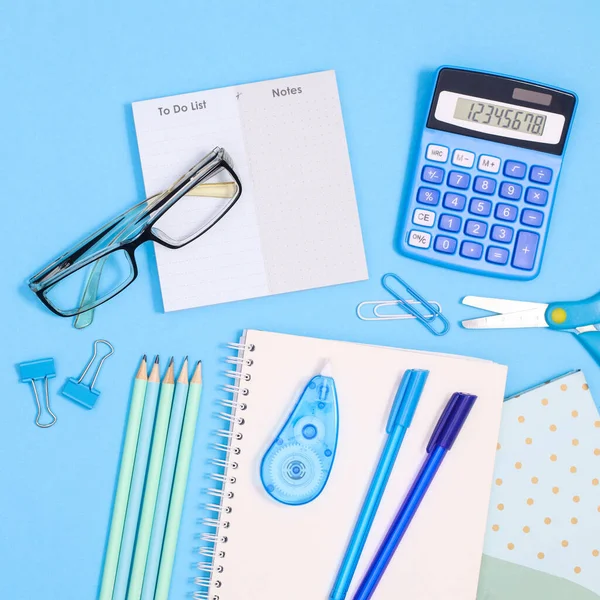 School and work stationery layout on pastel blue background. Flat lay. Back to school concept
