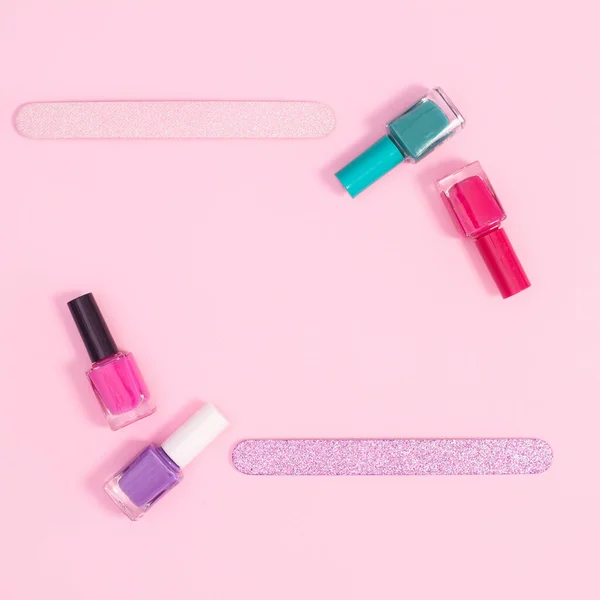 Nail Polish Bottles Files Pastel Pink Background Copy Space Frame — Stockfoto