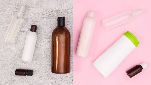Bottles of Beauty and cosmetics products on white and pink background. Flat lay