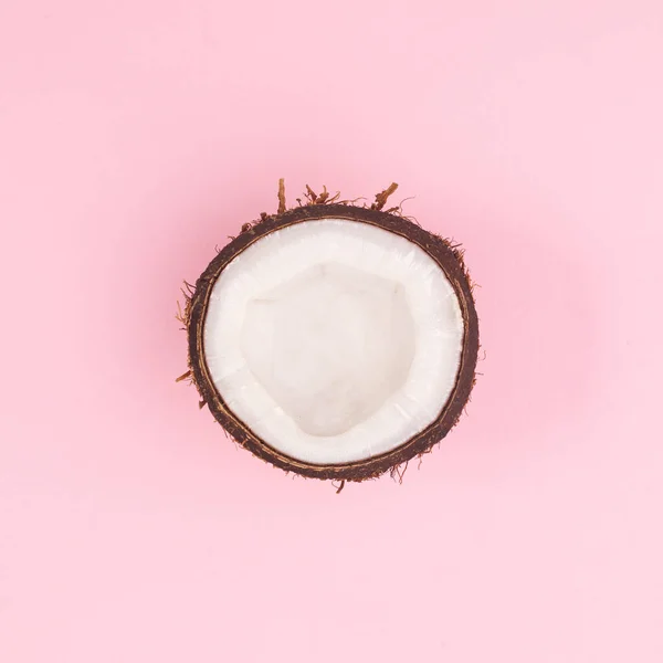 Half Organic Fresh Coconut Pastel Pink Background Flat Lay — Fotografia de Stock