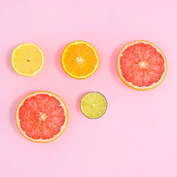 Creative Layout Sliced Citrus Fruits Bright Pink Background Summer Concept — Foto de Stock